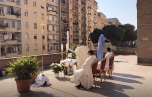 Fr. Carlo Purgatorio celebrates the rooftop Mass in Rome.   EWTN News