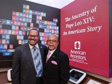 Jari Honora and Henry Louis Gates Jr. at the opening of the exhibit at American Ancestors headquarters in Boston.