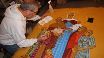 Father Richard Reiser, an iconographer based in Omaha, Nebraska, writes an icon of St. Bridget of Sweden with her family for FOCCUS Marriage Ministries’ 40th anniversary.