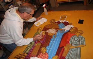 Father Richard Reiser, an iconographer based in Omaha, Nebraska, writes an icon of St. Bridget of Sweden with her family for FOCCUS Marriage Ministries’ 40th anniversary. Credit: Photo courtesy of FOCCUS