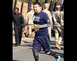 Archdiocese for the Military Services assistant development director Matthew Lockwood runs in Marine Corps Marathon, Oct. 27, 2013. ?w=200&h=150