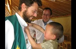 A Mongolian child helping Fr. Giorgio Marengo, IMC. ?w=200&h=150