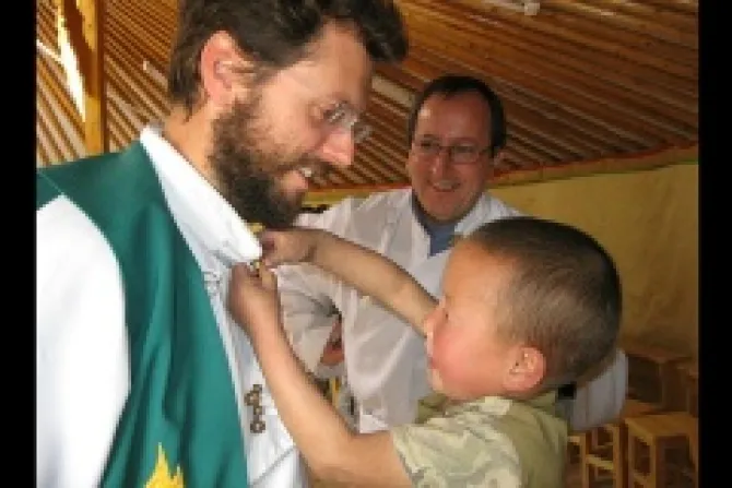 A Mongolian Child helping Fr Giorgio Marengo IMC Credit Cosolate Missionaries Mongolia CNA 3 7 14
