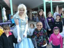 Student portrays Cinderella during the third annual KidsHope Day. Image courtesy of Notre Dame Preparatory. 