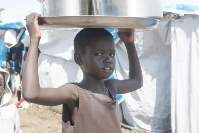 A child carrying water at the Tomping civilian protection site on May 6 2014 in Juba South Sudan Credit UN Photo Eskinder Debebe CNA 5 7 14