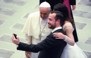 A couple snaps a selfie with Pope Francis at his Wednesday general audience on Feb. 4, 2015.   Daniel Ibanez/CNA.