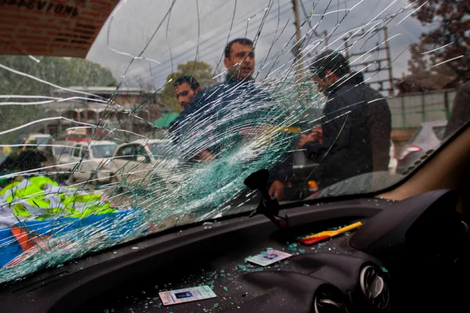 A damaged car hit by a tree branch in Srinagar India after the earthquake in northern Afghanistan and Pakistan on Oct 26 2015 Credit Yawar Nazir CNA 10 27 15