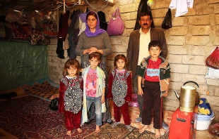 A family at the Sharia Al Haman Hope refugee camp in Duhok, Iraq, March 28, 2015.   Daniel Ibanez/CNA.