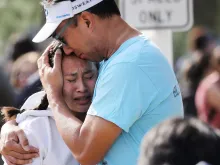 A father and daughter are reunited near Saugus High School after a Nov 14. 2019 shooting. 