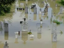 A flooded cemetery in the Archdiocese of Vhrbosna in Sarajevo. 