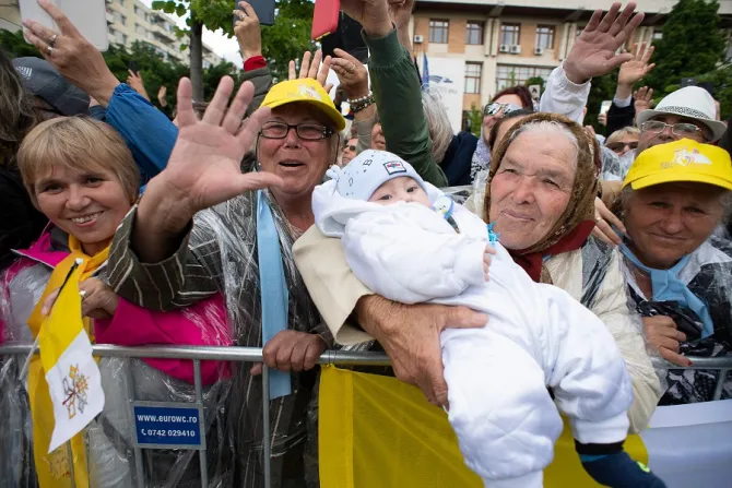 A grandmother and grandchild greet Pope Francis in Romania June 1 2019 Credit Vatican Media