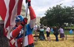 A man dressed as Captain America and holding an American flag takes part in the March for Marriage in Washington, D.C., June 19, 2014. ?w=200&h=150