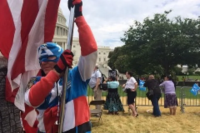 A man dressed as Captain America holding an American flag takes part in the March for Marriage in Washington DC June 19 2014 Credit Addie Mena CNA CNA 6 19 14