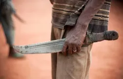 A man holds a machete (aka Balaka in Songo) on Nov. 8, 2013 in the outskirts of Bangui, Central African Republic. ?w=200&h=150
