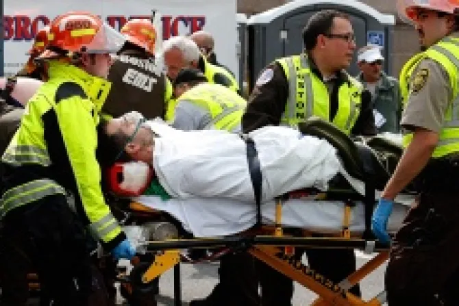 A man is loaded into an ambulance after he was injured by one of two bombs exploded during the 117th Boston Marathon Credit Jim Rogash Getty Images News Getty Images CNA 4 15 13