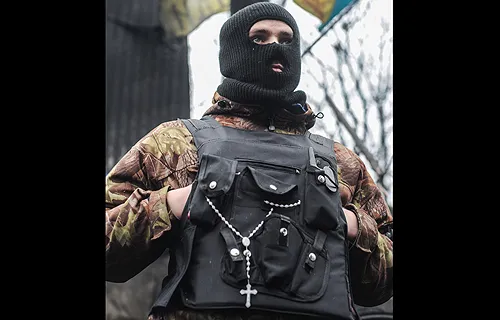 A protestor wearing a rosary in Maidan Square in Kyiv, Feb. 2014. ?w=200&h=150