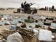 A rebel mans an anti-aircraft gun in Ras Lanuf March 8, 2011 / Photo 