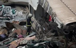 A rescue worker sifts through the crash scene outside of Santiago de Compostela, Spain on July 25, 2013. Pablo Blazquez Dominguez/Getty Images News.?w=200&h=150