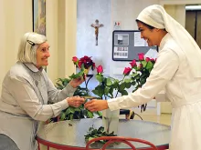 Arranging flowers at the Little Sisters' of the Poor Mullen Home, one of the institutions serving through the maintenance of religious liberty. 