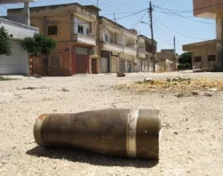A shell lays in the middle of the street in Homs, Syria, a remnant of the June 11, 2012 heavy attack leveled on the city. ?w=200&h=150