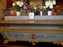 A side altar vandalized with blasphemous graffiti in Santiago de Chile's cathedral, July 25, 2013. 
