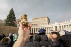 A statue of the Baby Jesus from a Nativity scene is held up for the blessing at St Peter's Square on “Bambinelli” Sunday, Dec. 15, 2013.?w=200&h=150