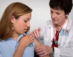 A student recieves a vaccination. ?w=200&h=150