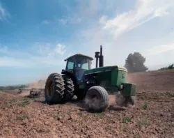 A tractor turns the cover crop into the soil in preparation for planting in the Salinas Valley of Calif. on June 16, 2011. ?w=200&h=150