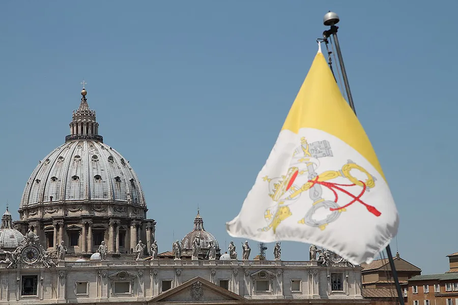 A view of St. Peter's Basilica and Vatican City flag from the roof of a nearby building on June 5, 2015. ?w=200&h=150