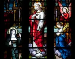 A window in Ireland's Tuam Cathedral shows St. Marguerite Marie Alacoque receiving a private revelation of the Sacred Heart. ?w=200&h=150