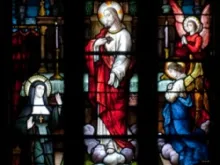 A window in Ireland's Tuam Cathedral shows St. Marguerite Marie Alacoque receiving a private revelation of the Sacred Heart. 