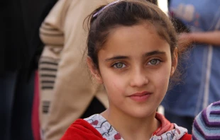 An Iraqi Christian refugee at a church shelter in Jordan, Oct. 28, 2014.   Kim Pozniak/Catholic Relief Services.