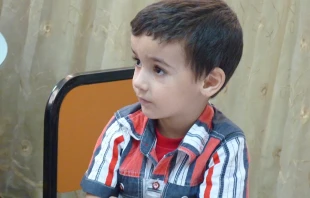 A young Syrian refugee at school in Ramtha, Jordan.   Kevin Jones/CNA.