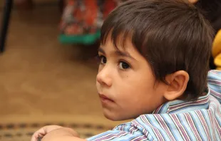 A young Syrian refugee at school in Ramtha, Jordan on Oct. 27, 2014.   Kim Pozniak/Catholic Relief Services.