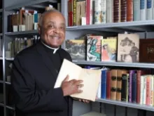 Archbishop Wilton Gregory holds a signed, first edition copy of “Gone With the Wind.” Photo used with the permission of the Archdiocese of Atlanta. Taken by Michael Alexander for The Georgia Bulletin.