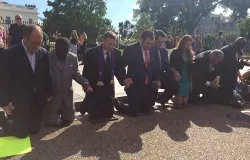 Participants kneel at a Sept. 26 prayer vigil for Pastor Saeed Abedini, held in Washington, D.C. ?w=200&h=150