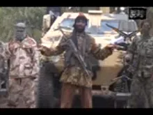 Abubakar Shekau in a low quality video admitted to kidnapping nearly 300 girls in Nigeria and threatened to sell them (Screengrab).