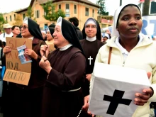 Activists against the decriminalization of abortion hold a demonstration outside the Ecuadorian Congress building in Quito, Sept. 17, 2019. 