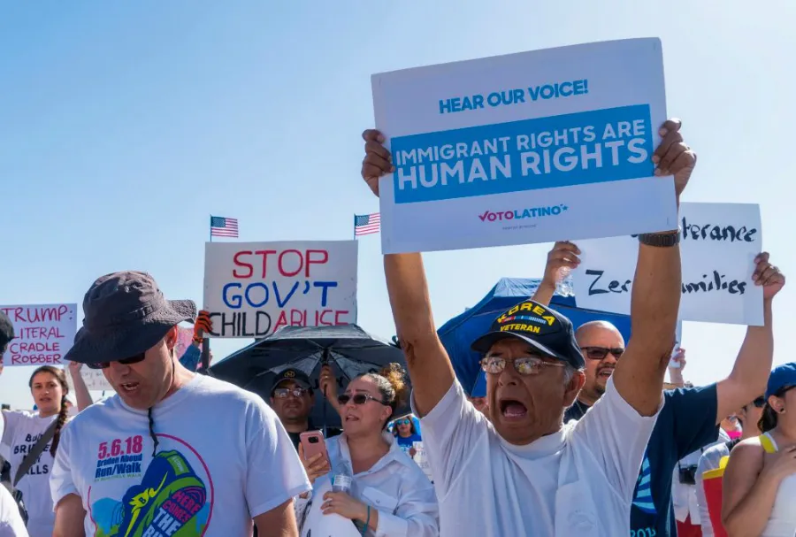 Activists shout chants during an 'End Family Detention' event at the Tornillo Port of Entry in Tornillo, Texas, June 24, 2018. ?w=200&h=150