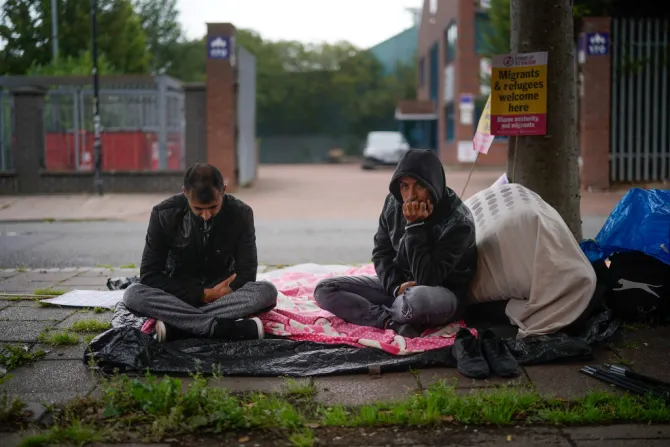 Afghan refugee Rahman Sahah R and Mirwais Ahmadzai start a hunger strike Aug 1 2018 in Glasgow Both have been refused asylum in the UK Credit Christopher Furlong Getty Images