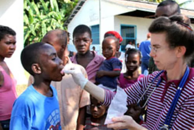 Aid worker administers medicine in Haiti CNA World Catholic News 11 24 10