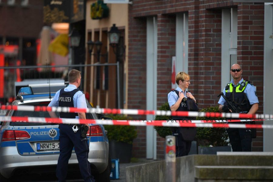 Police stand near the site of a van attack on a crowd of pedestrians in Muenster, Germany April 7, 2018. ?w=200&h=150