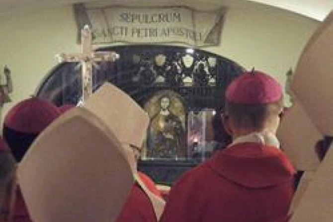 American bishops pray before the tomb of St Peter under the main altar of St Peters Basilica in Rome CNA US Catholic News 12 1 11