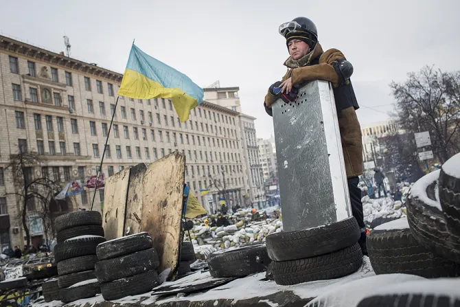 An anti government protestor stands on top of a barricade on Grushevskogo Street Jan 29 2014 in Kiev Ukraine Credit Rob Stothard Getty Images CNA 6 5 15