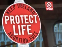pro-life sign on the inside of a bus window during a July 2, 2011 rally in Dublin, Ireland. 