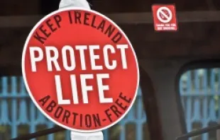 pro-life sign on the inside of a bus window during a July 2, 2011 rally in Dublin, Ireland.   William Murphy-infomatique via Flickr (CC BY-SA 2.0)
