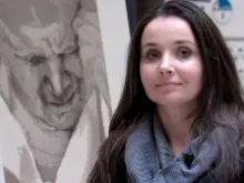 Anna Gulak with her drawing of Saint John Paul II on April 28, 2014. 