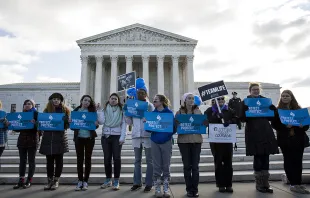 Anti-abortion advocates stand outside of the Supreme Court, March 2, 2016 in Washington, DC during abortion arguments.   Drew Angerer/Getty Images.