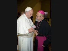 Archbishop Anthony Apuron greets Pope Francis Feb. 7, 2018. 