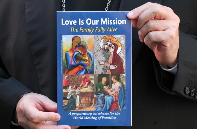 Archbishop Charles Chaput and the World Meeting of Families catechesis book in Rome on Sept. 15, 2014. ?w=200&h=150